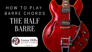 How to play barre chords and picture of Gibson 335 electric guitar
