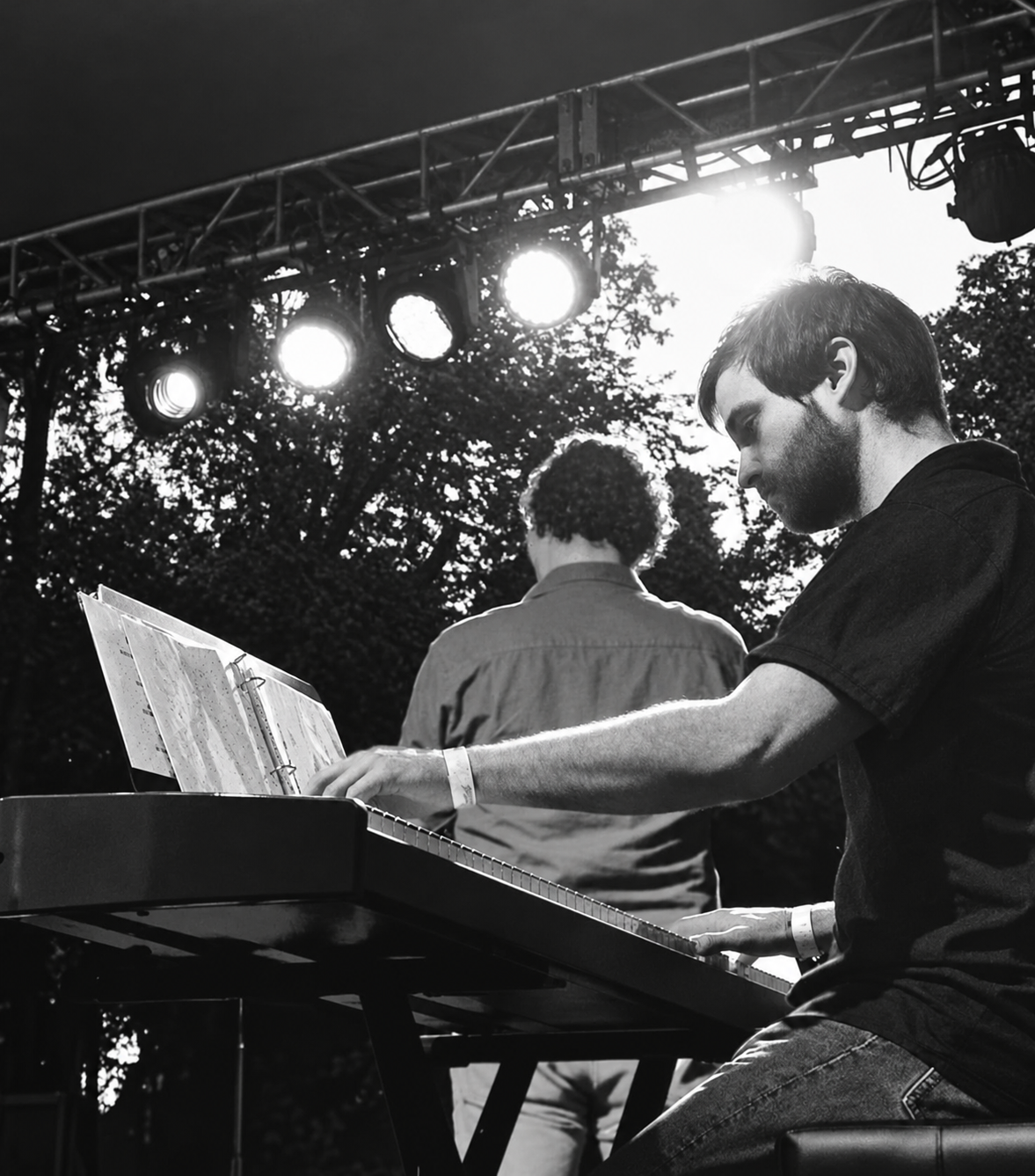 Kent Toalson performing on keyboard during a live show