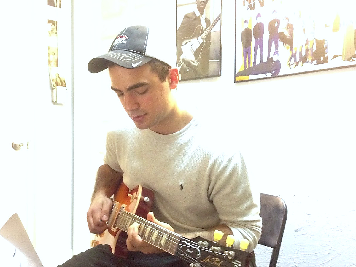 Student taking a private guitar lesson at Green Hills Guitar Studio in Nashville